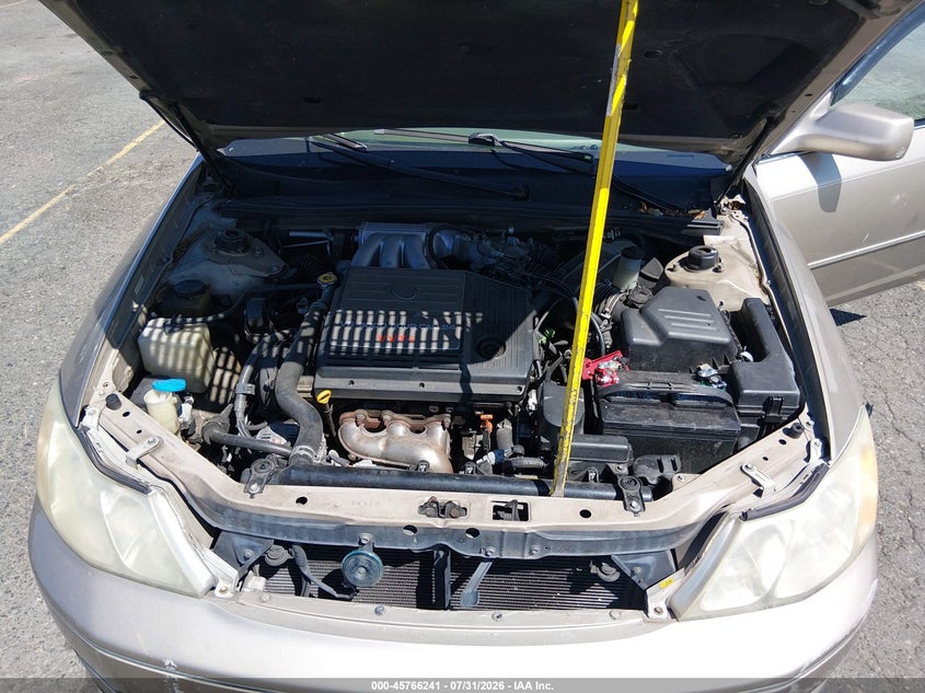 TOYOTA AVALON 2000 VIN 4T1BF28B0YU009371