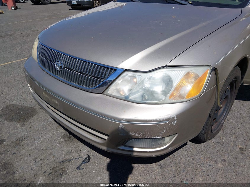 TOYOTA AVALON 2000 VIN 4T1BF28B0YU009371