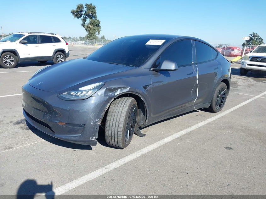 2023 Tesla Model Y, Удар ззаду, IAAI, VIN 7SAYGDEE4PA113410 — фото 2
