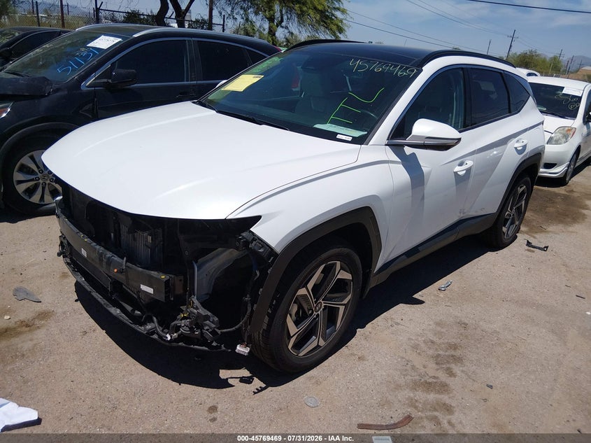 2023 HYUNDAI TUCSON HYBRID auction photo 2