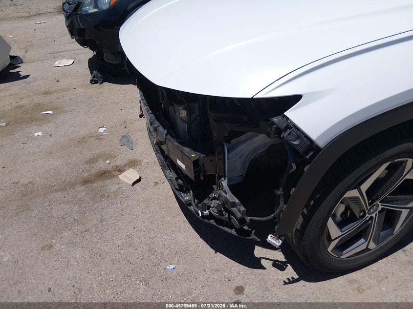 2023 HYUNDAI TUCSON HYBRID auction photo 6
