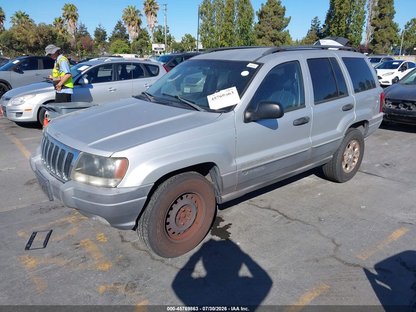 2002 Jeep Grand Cherokee Sport, Left Rear, IAAI, VIN 1J4GW38SX2C258400 — photo 2