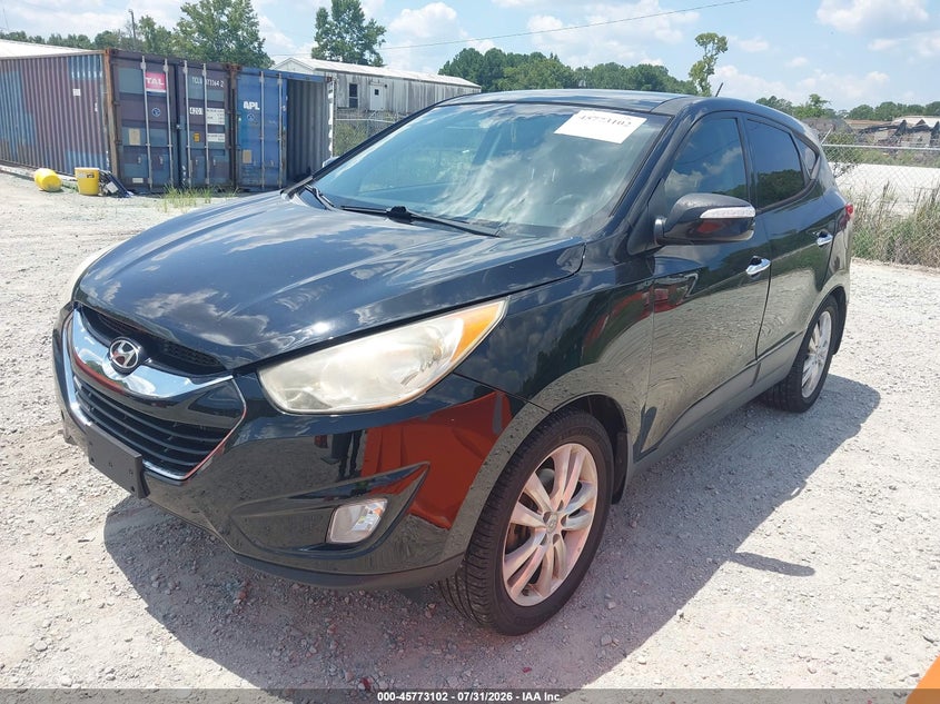 2012 Hyundai Tucson, Normal Wear & Tear, IAAI, VIN KM8JUCAC5CU378438 — photo 2