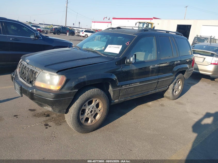 2000 Jeep Grand Cherokee Laredo, Normal Wear & Tear, IAAI, VIN 1J4GW48S8YC306250 — photo 2