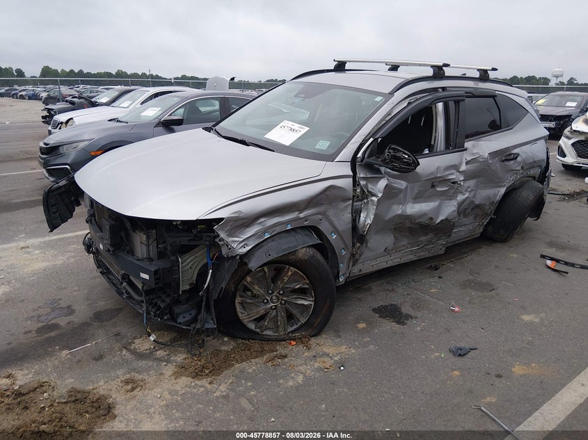 2024 HYUNDAI TUCSON HYBRID auction photo 2