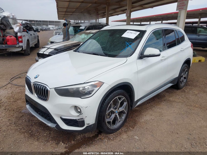 2018 BMW X1, Normal Wear & Tear, IAAI, VIN WBXHU7C32J3H43884 — photo 2