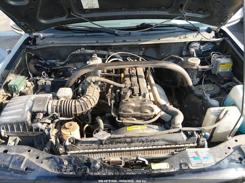 CHEVROLET TRACKER 2002 VIN 2CNBE13C726938220
