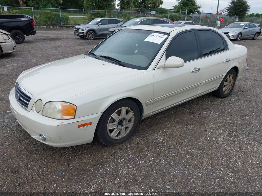 2004 Kia Optima, Front & Rear, IAAI, VIN KNAGD126345365112 — photo 2