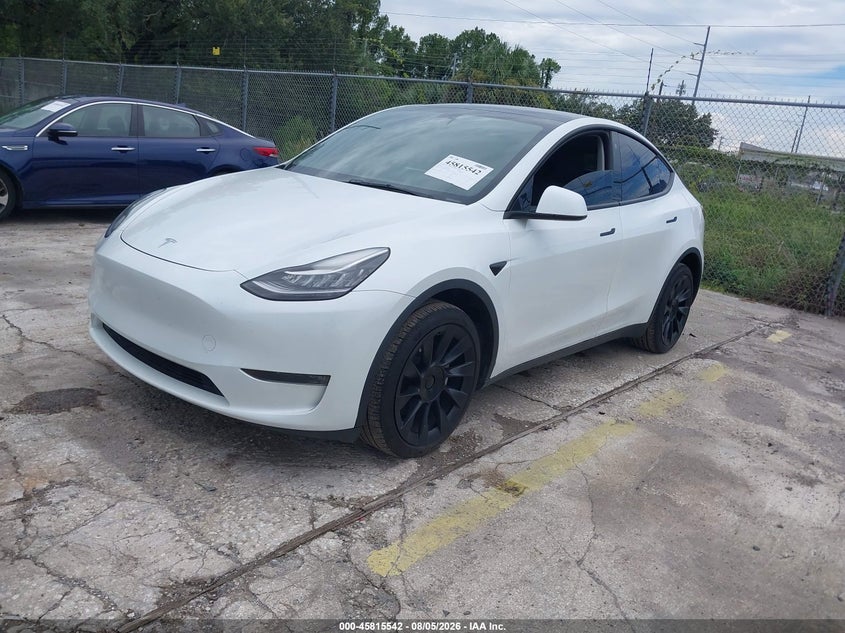 2023 Tesla Model Y, Обычный износ, IAAI, VIN 7SAYGDEE0PA024918 — фото 2