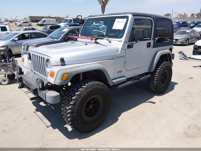2002 Jeep Wrangler, Rear, IAAI, VIN 1J4FA39SX2P750958 — photo 2