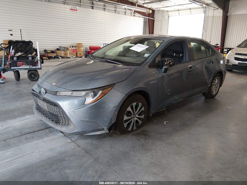 2021 Toyota Corolla Hybrid Le, Left Side, IAAI, VIN JTDEAMDEXMJ031577 — photo 2