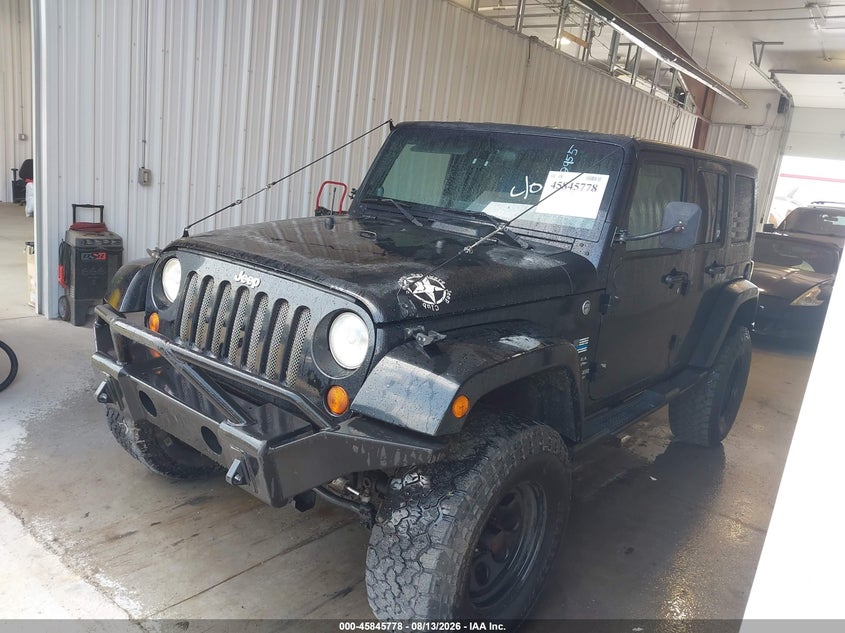 2008 Jeep Wrangler, Normal Wear & Tear, IAAI, VIN 1J8GA59158L592955 — photo 2