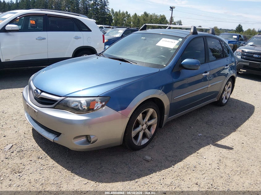 2010 SUBARU IMPREZA OUTBACK SPORT auction photo 2