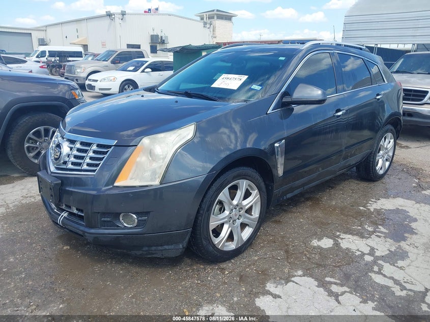2013 Cadillac SRX, Обычный износ, IAAI, VIN 3GYFNEE36DS596428 — фото 2