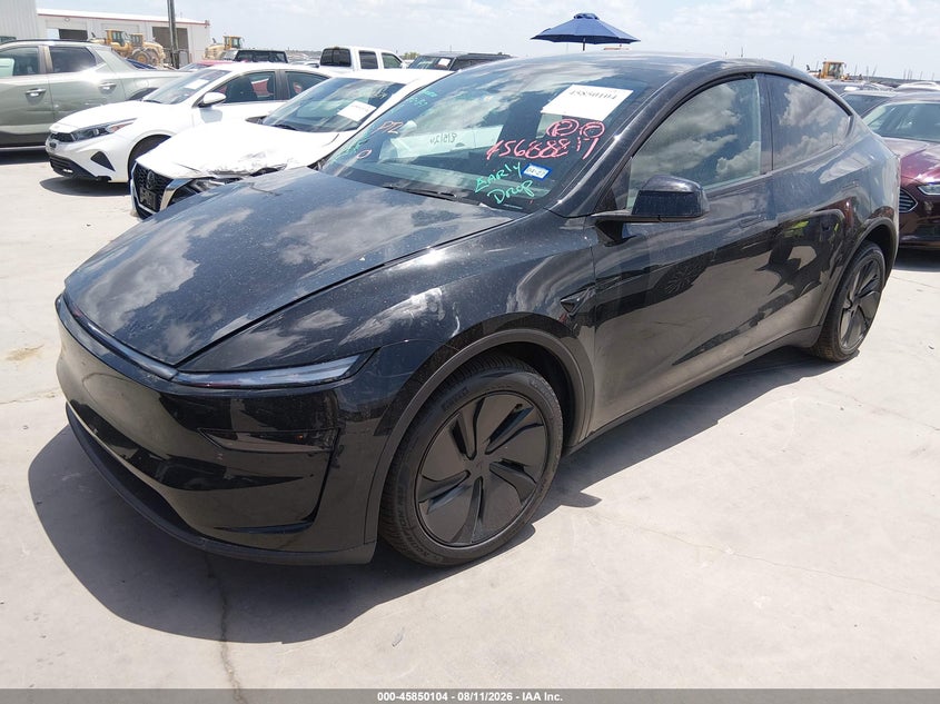 2026 Tesla Model Y, Right Front, IAAI, VIN 7SAYGDED0TA674821 — photo 2