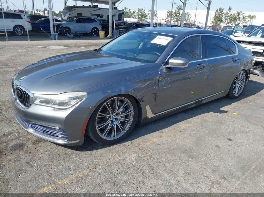 2016 BMW 7er, Левый бок, IAAI, VIN WBA7F0C5XGGL99700 — фото 2