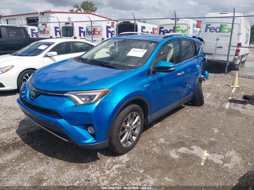 2016 Toyota RAV 4, Левый зад, IAAI, VIN JTMDJREV4GD007639 — фото 2