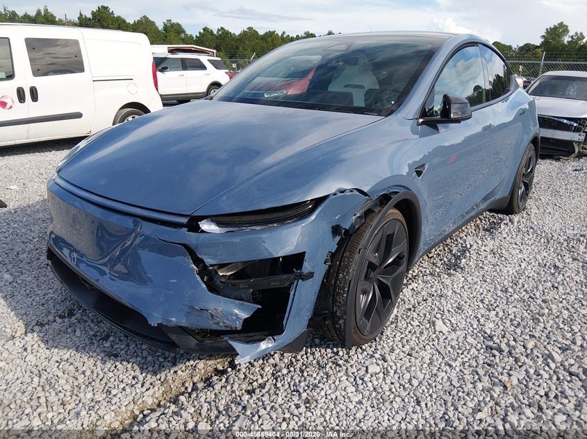 2026 Tesla Model Y, Left Front, IAAI, VIN 7SAYGDET8TA732925 — photo 2