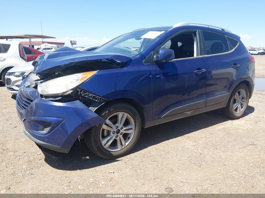 2011 Hyundai Tucson, Normal Wear & Tear, IAAI, VIN KM8JU3AC0BU239106 — photo 2