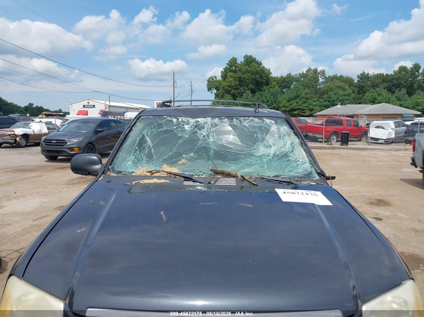GMC ENVOY 2006 VIN 1GKDS13S262130264