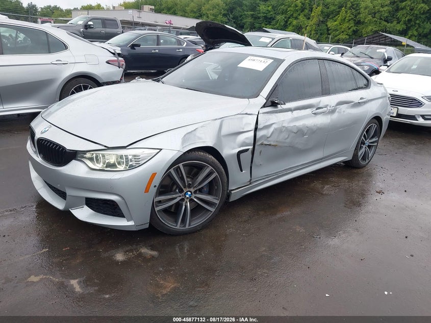 2015 BMW 4er, Left Side, IAAI, VIN WBA4B3C55FD670291 — photo 2