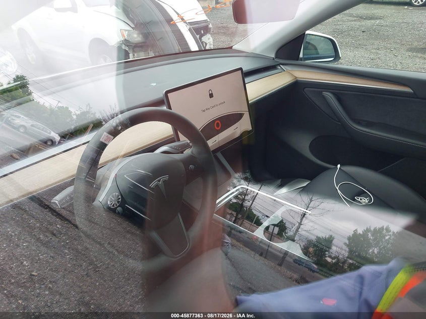 TESLA MODEL Y 2023 VIN 7SAYGDEE1PF771172