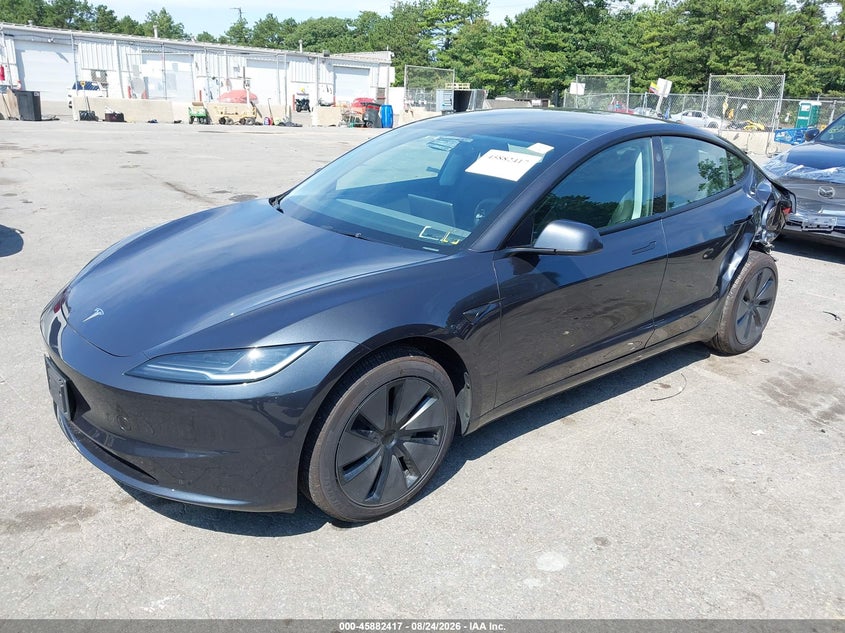 2025 Tesla Model 3, Left Side, IAAI, VIN 5YJ3E1EA4SF994632 — photo 2