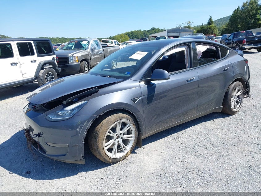2023 Tesla Model Y, Front & Rear, IAAI, VIN 7SAYGDEE0PA054467 — photo 2