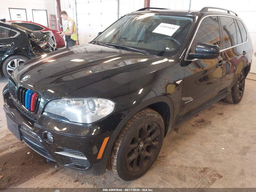 BMW X5 2013 VIN 5UXZV4C5XD0E02090