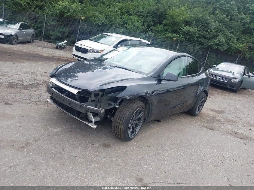 2024 Tesla Model Y, Front & Rear, IAAI, VIN 7SAYGDEE0RA321089 — photo 2