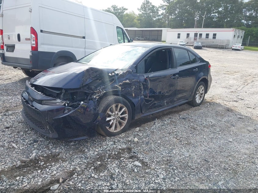 2021 Toyota Corolla, Left Side, IAAI, VIN JTDHPMAE4MJ130783 — photo 2