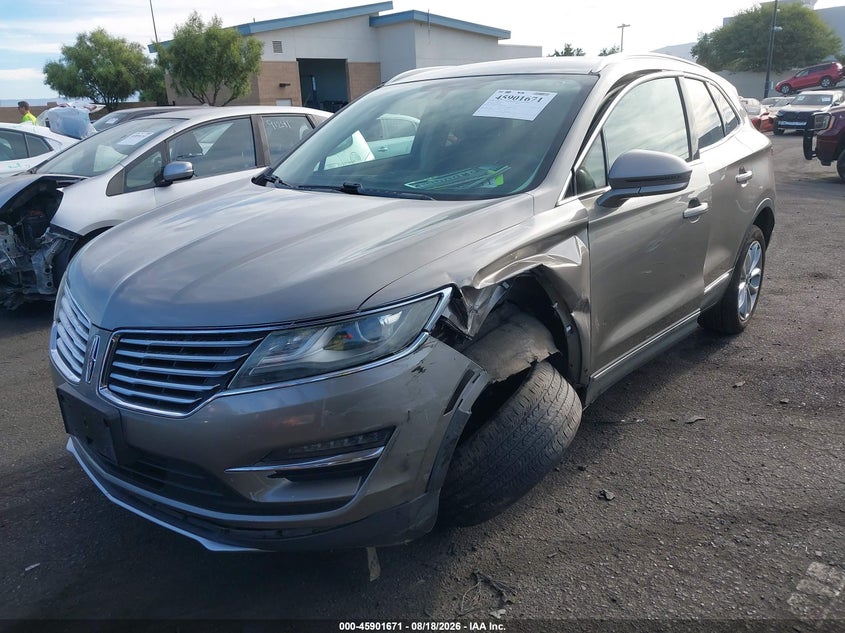 2016 Lincoln MKC, Левый бок, IAAI, VIN 5LMCJ2C90GUJ21946 — фото 2