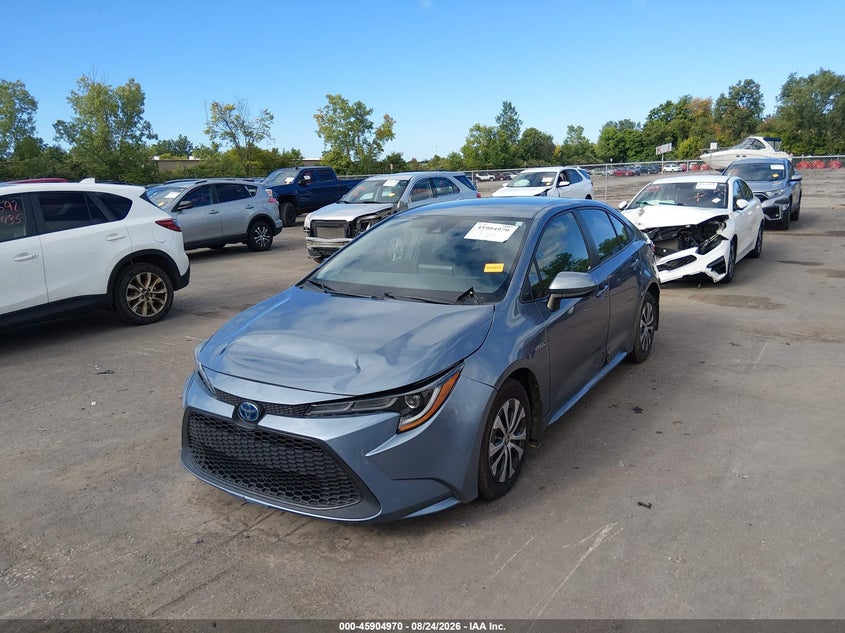 2021 Toyota Corolla, Left & Right Side, IAAI, VIN JTDEAMDE3MJ026009 — photo 2