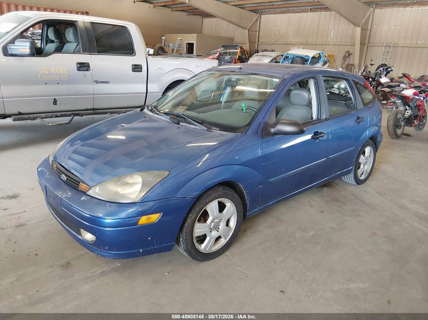 2003 Ford Focus, Обычный износ, IAAI, VIN 3FAHP37323R119565 — фото 2