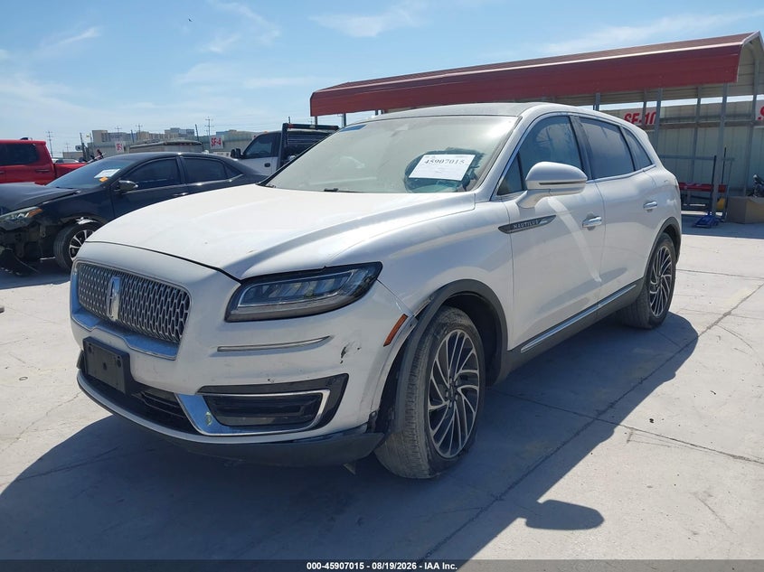 2019 Lincoln Nautilus, Left Front, IAAI, VIN 2LMPJ6LP7KBL22059 — photo 2
