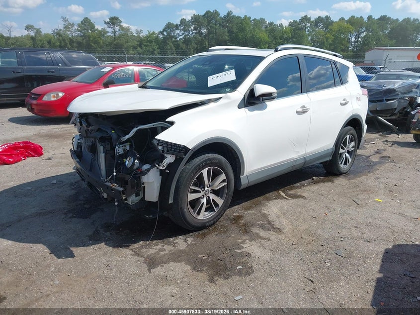 2017 Toyota RAV 4, Front & Rear, IAAI, VIN JTMRFREV6HJ124083 — photo 2