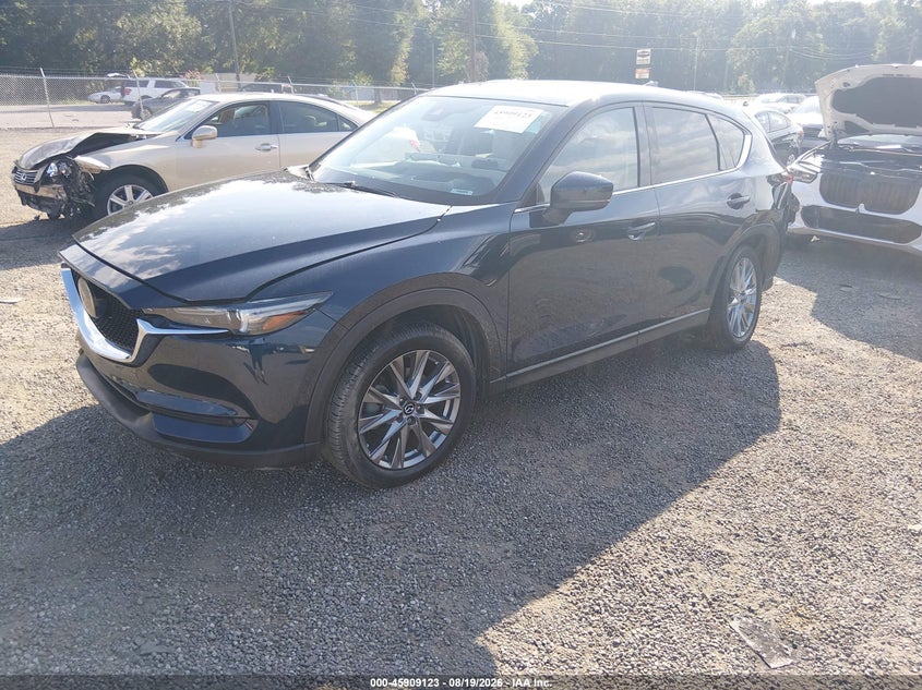 2021 Mazda CX-5, Левый зад, IAAI, VIN JM3KFBAY8M0476923 — фото 2