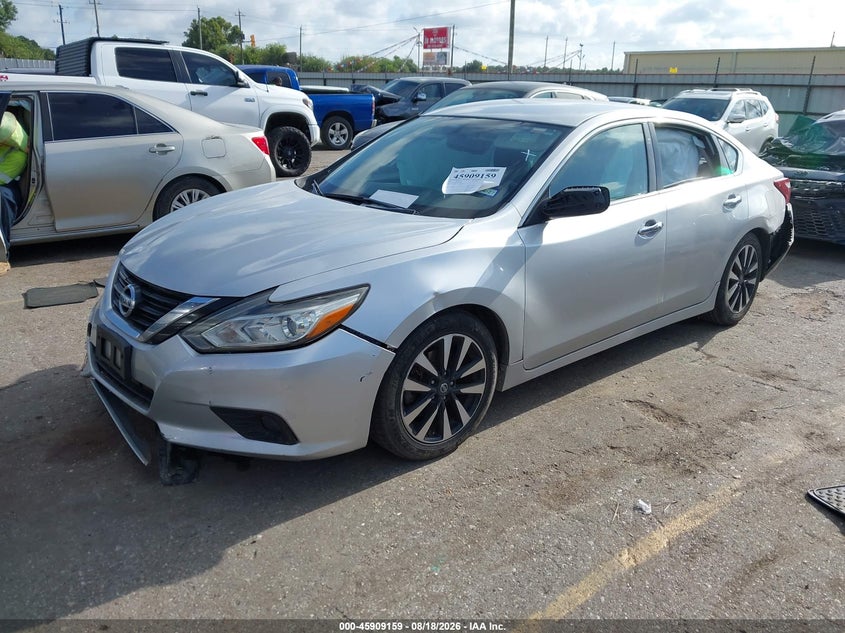 2018 Nissan Altima, Front & Rear, IAAI, VIN 1N4AL3AP8JC176664 — photo 2