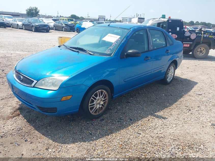 2007 Ford Focus, Обычный износ, IAAI, VIN 1FAFP34N97W251240 — фото 2