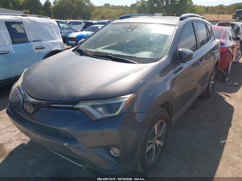 2018 Toyota RAV 4, Лівий зад, IAAI, VIN JTMWFREV4JJ171413 — фото 2