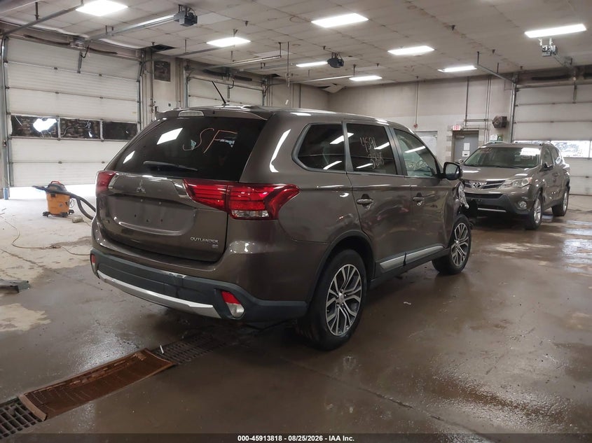 MITSUBISHI OUTLANDER 2016 VIN JA4AZ3A34GZ021387