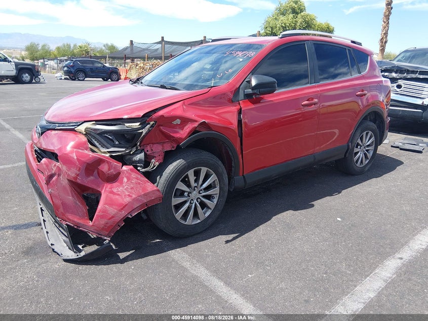 2016 Toyota RAV 4, Left Front, IAAI, VIN JTMBFREV3GJ052291 — photo 2