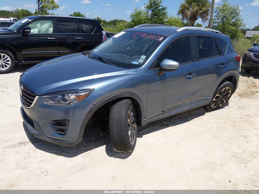 2016 Mazda CX-5, Front & Rear, IAAI, VIN JM3KE2DYXG0721109 — photo 2