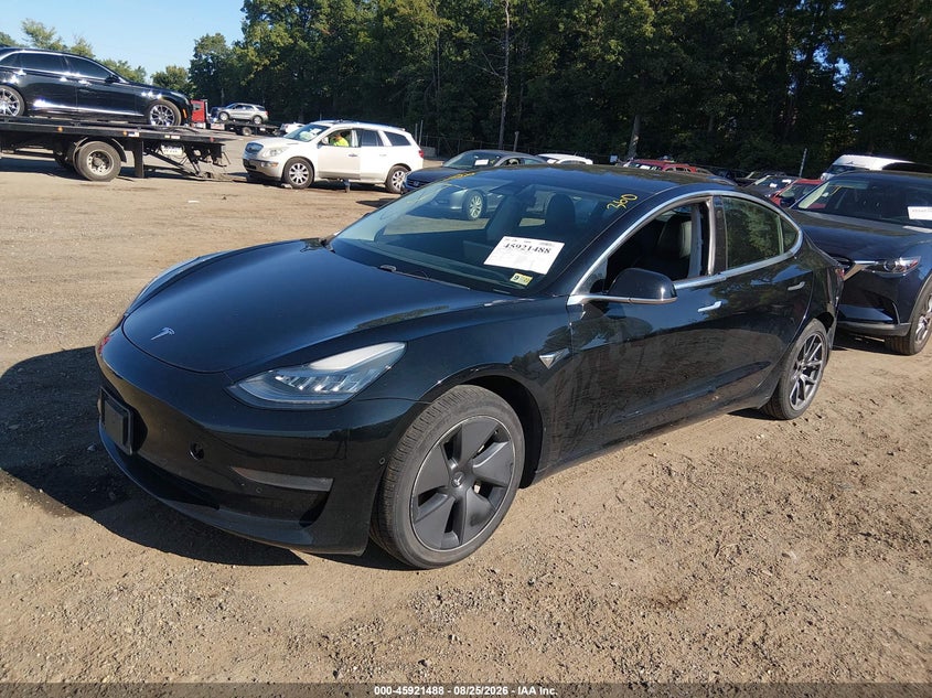 2019 Tesla Model 3, Левый зад, IAAI, VIN 5YJ3E1EAXKF396139 — фото 2