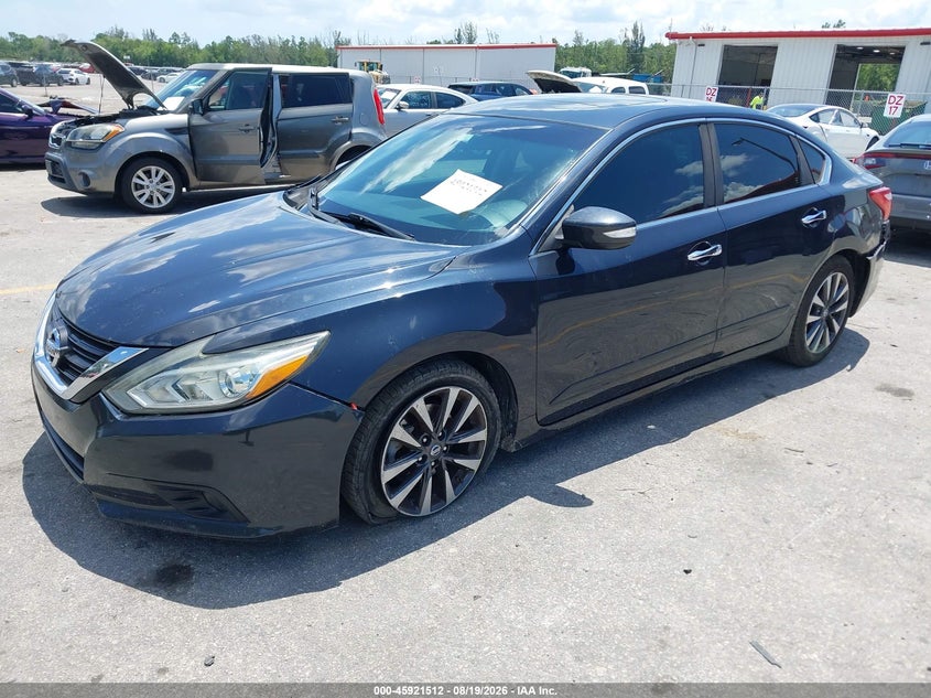 2016 Nissan Altima, Front & Rear, IAAI, VIN 1N4AL3AP2GC168830 — photo 2