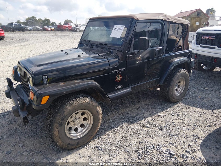 2000 Jeep Wrangler, Right Side, IAAI, VIN 1J4FA59S7YP744300 — photo 2