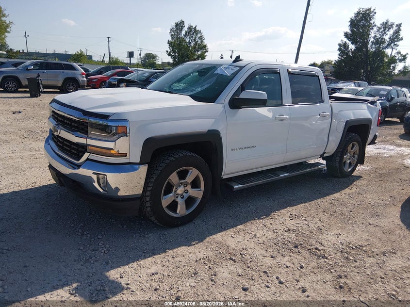 2016 Chevrolet Silverado, Storm Damage, IAAI, VIN 3GCUKREC7GG341257 — photo 2