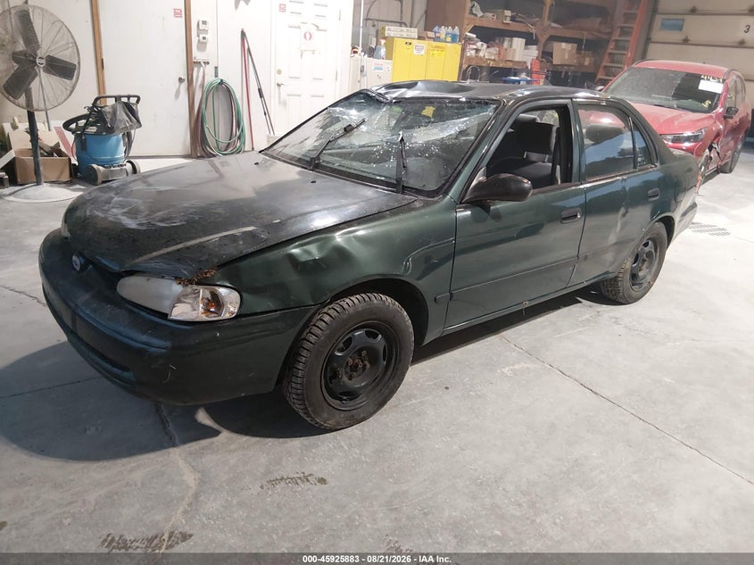 2002 Chevrolet Prizm, Rollover, IAAI, VIN 1Y1SK52832Z401457 — photo 2