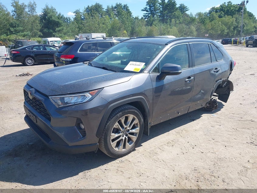 2019 Toyota RAV 4, Левый зад, IAAI, VIN JTMA1RFVXKD516077 — фото 2