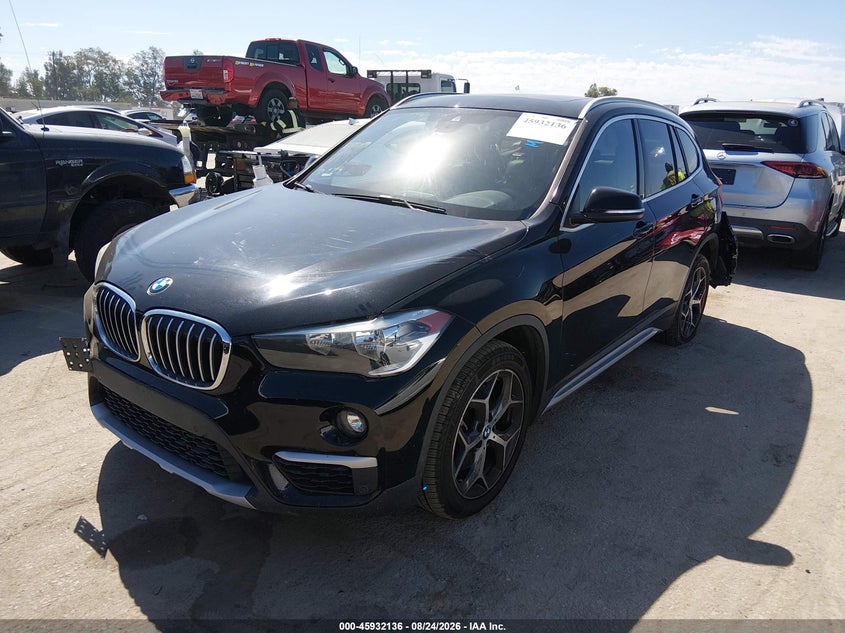 2019 BMW X1, Лівий зад, IAAI, VIN WBXHU7C5XK5L11077 — фото 2